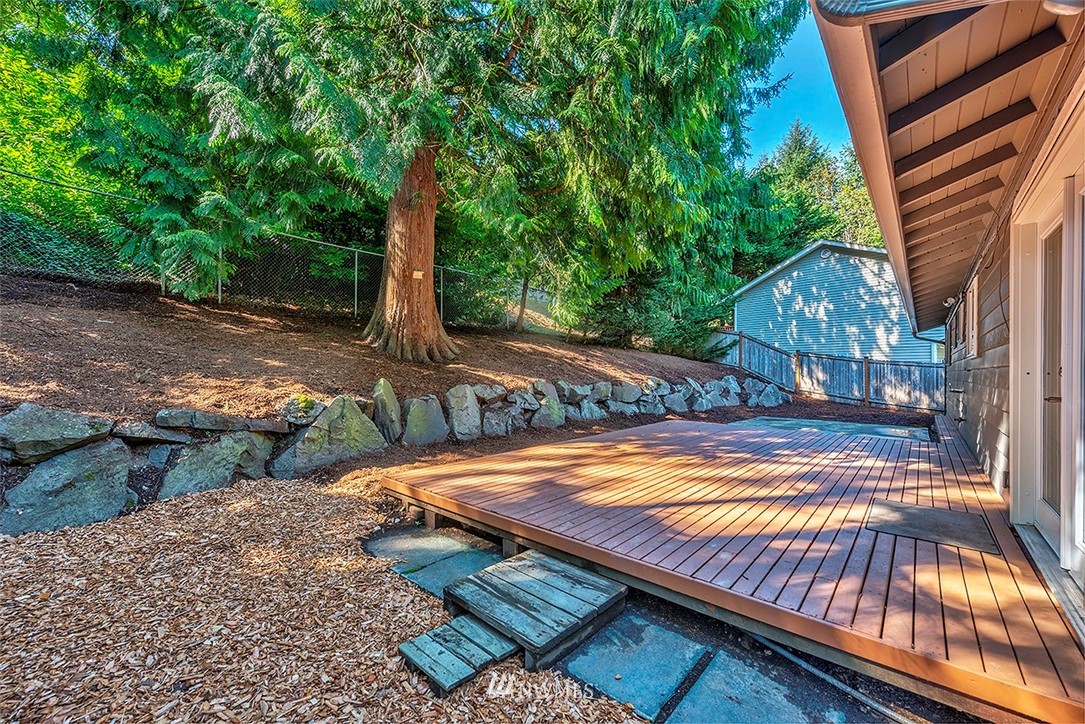 23002 Atlas Road Bothell, WA 98021 - Photo 4 of 23 a view of a backyard with trees