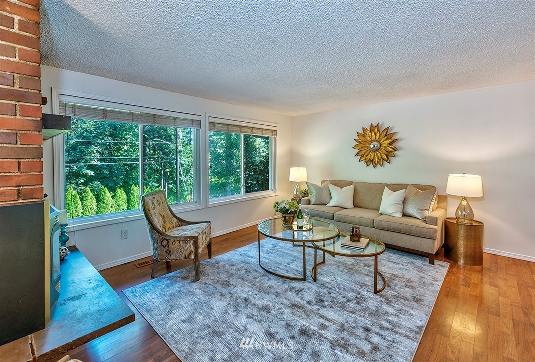 23002 Atlas Road Bothell, WA 98021 - Photo 6 of 23 a living room with furniture and a large window