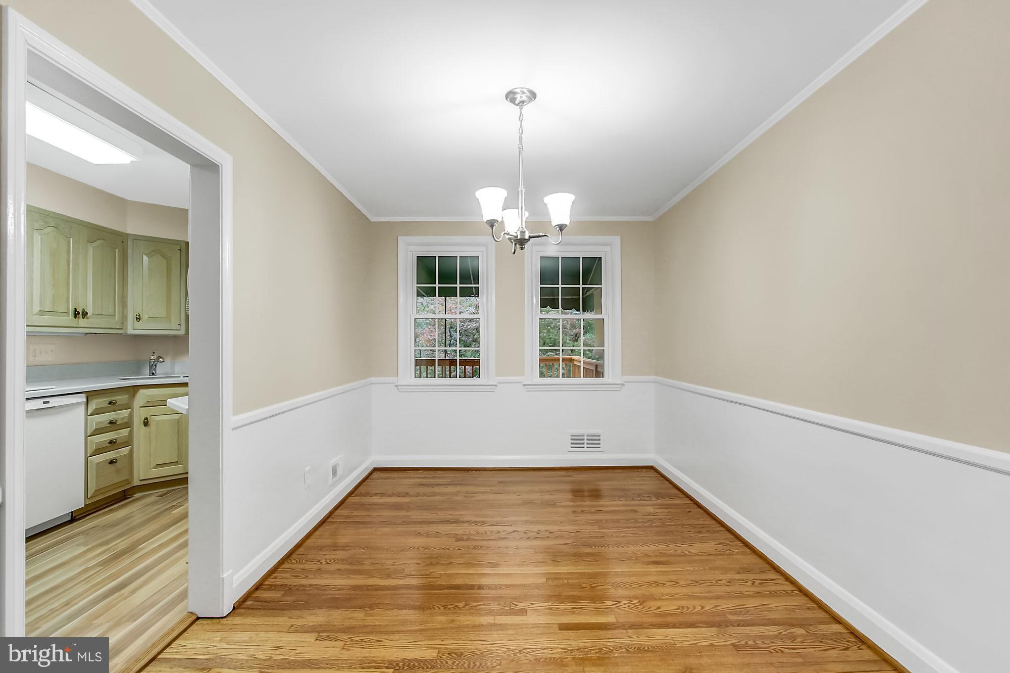 1629 Hardwick Road Baltimore, MD 21286 - Photo 7 of 22 Chair Rail and Crown Molding accents
