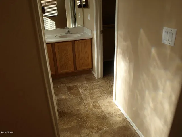 a view of hallway with sink