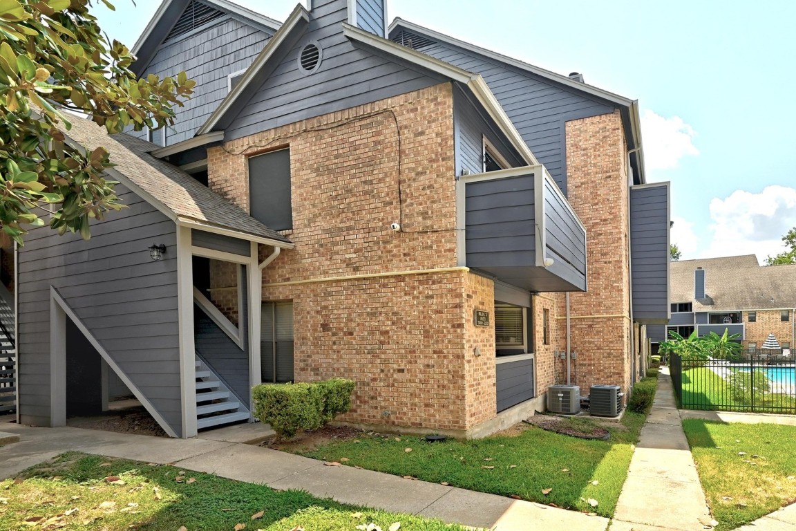 2500 Burleson Road, Unit 311 Austin, TX 78741 - Photo 16 of 16 a view of a house with a yard