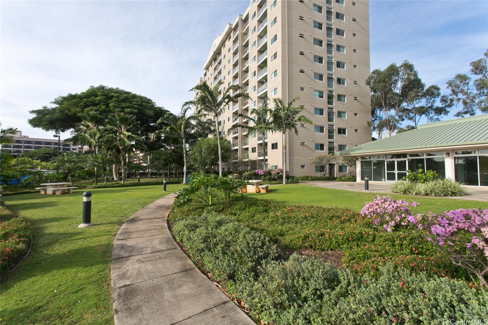 94-302 Paiwa Street, Unit 202 Waipahu, HI 96797 - Photo 11 of 12 a view of a garden with a fountain