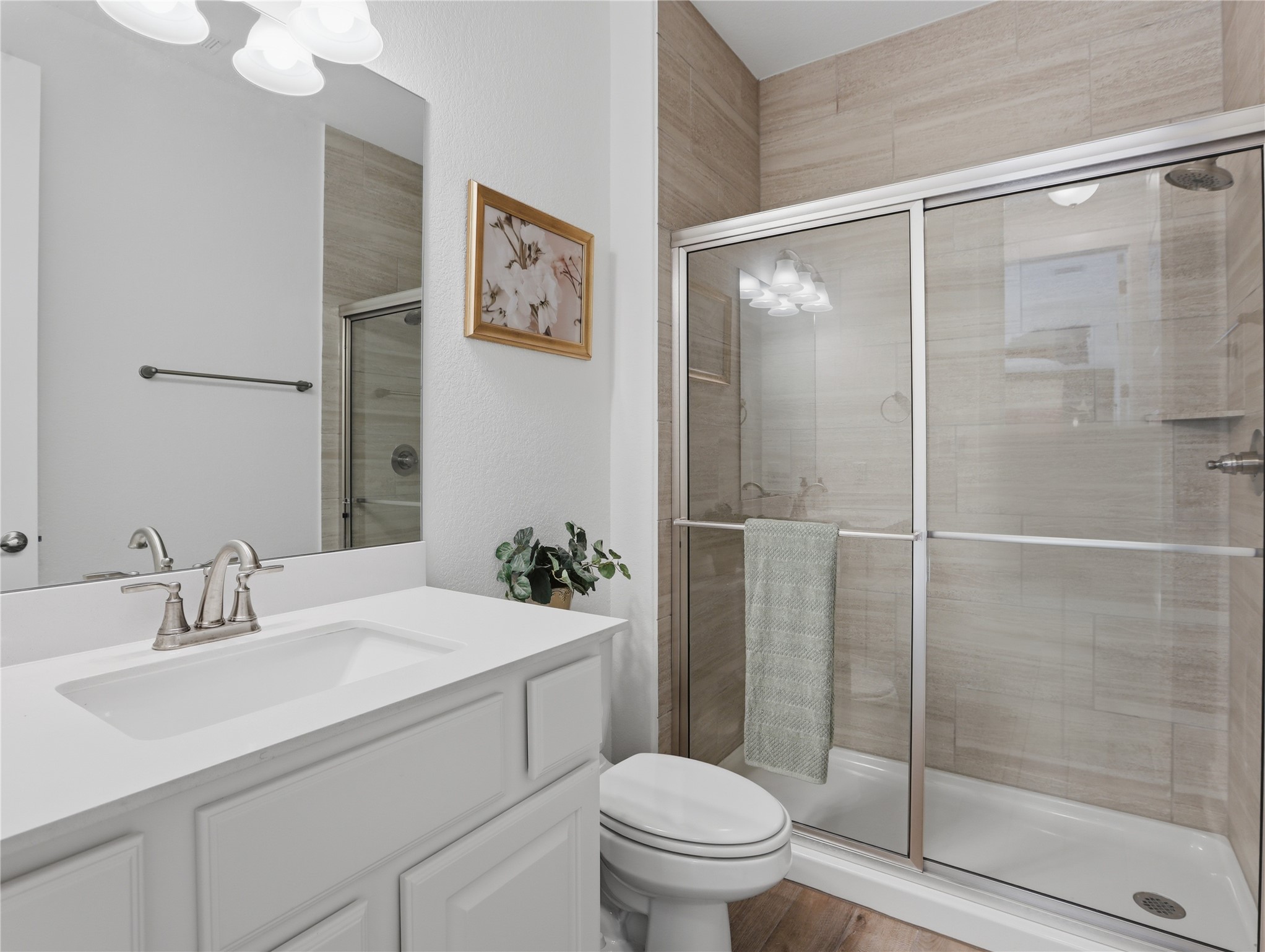 316 Raptor Beak Way Cedar Creek, TX 78612 - Photo 24 of 30 a bathroom with a sink toilet and shower