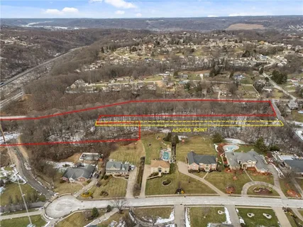 an aerial view of residential building and lake view