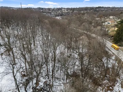 a view of mountain view with lots of trees