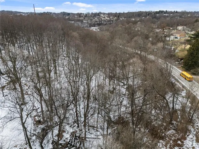 a view of mountain view with lots of trees