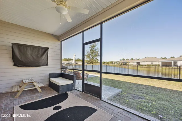 a view of a house with backyard and swimming pool