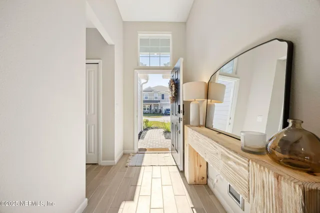 a spacious bathroom with a granite countertop shower