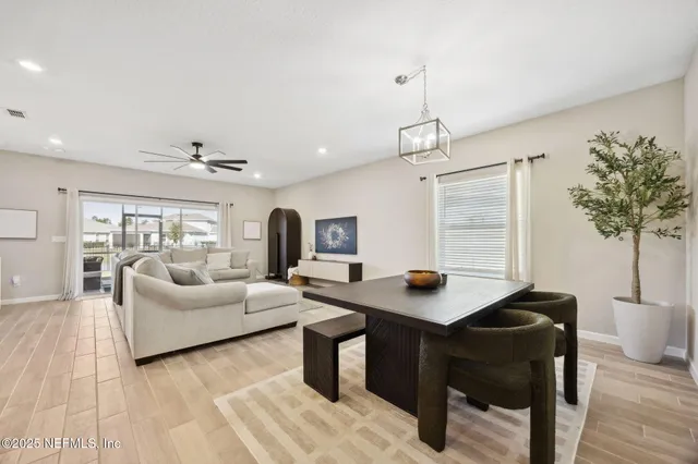 a living room with furniture and a table