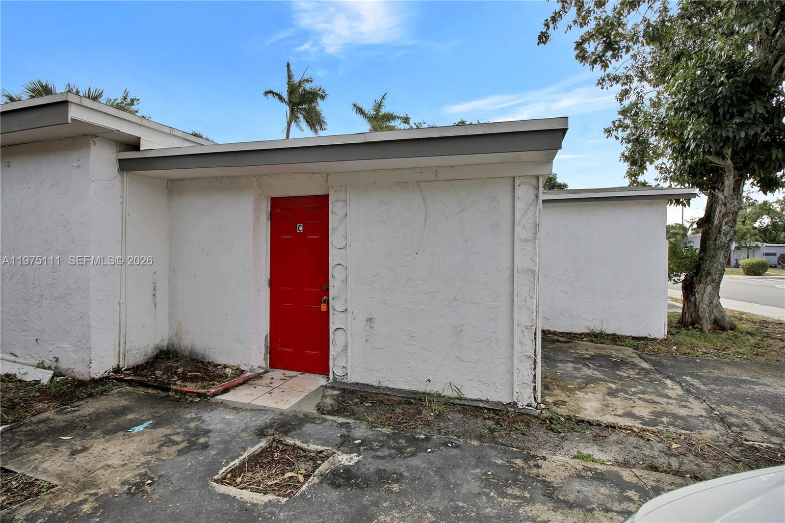 1160 West 26th Court Riviera Beach, FL 33404 - Photo 15 of 40 a view of a house with a outdoor space