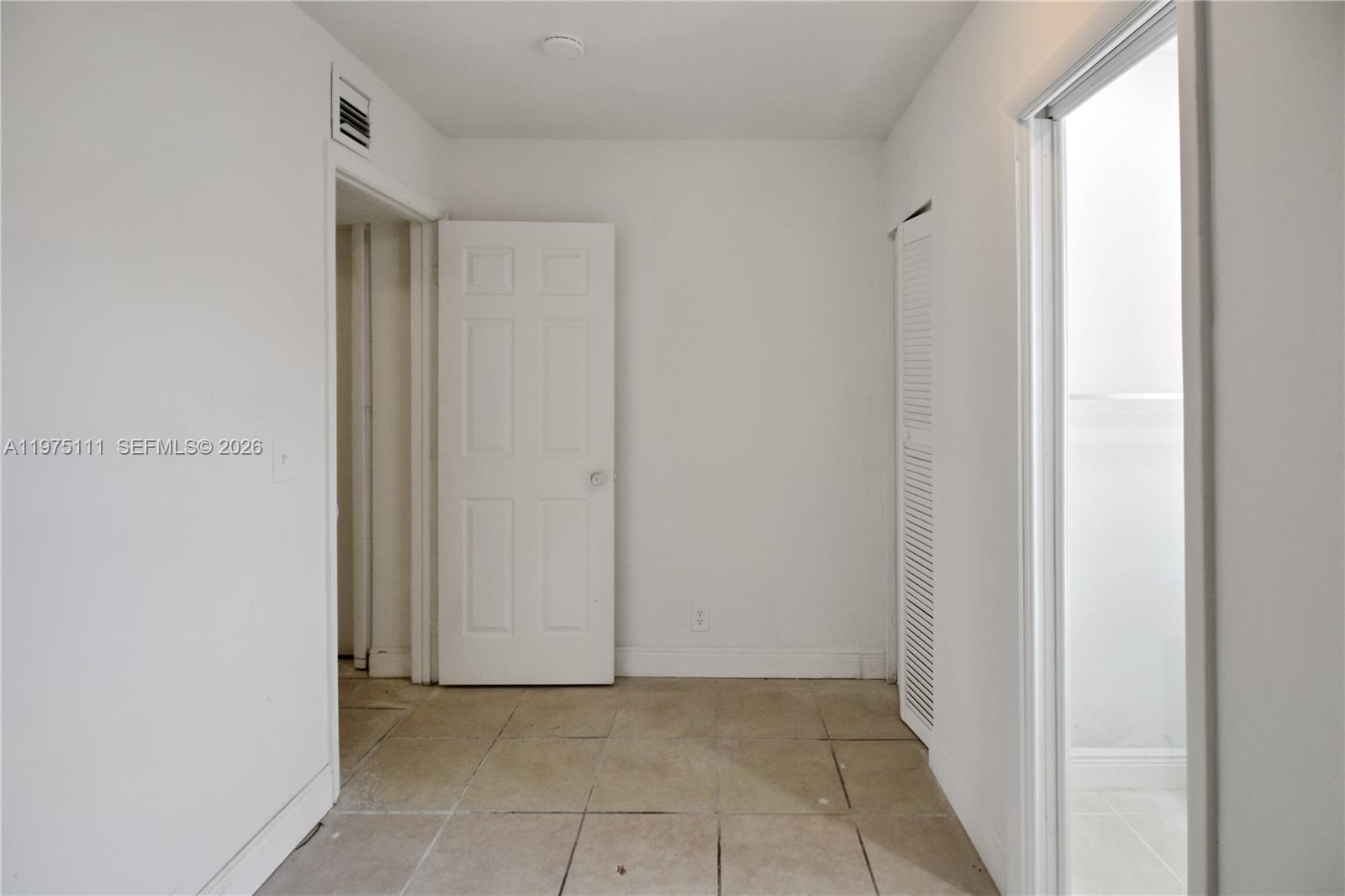 1160 West 26th Court Riviera Beach, FL 33404 - Photo 24 of 40 a view of an empty room
