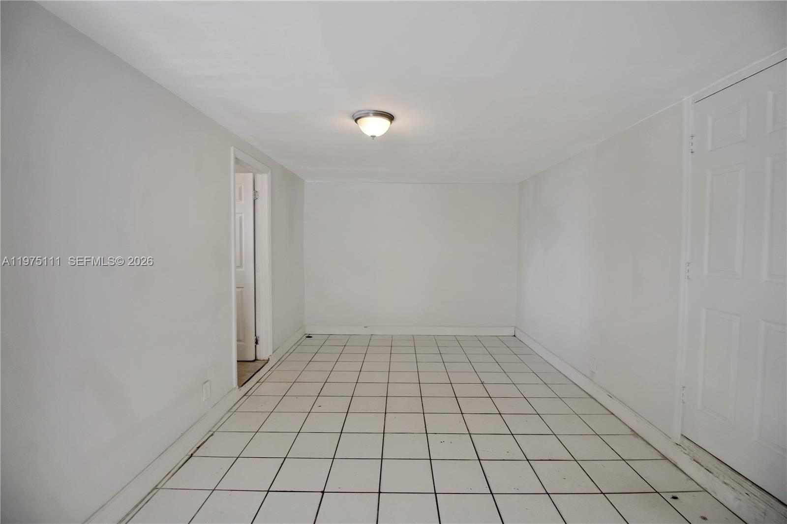 1160 West 26th Court Riviera Beach, FL 33404 - Photo 27 of 39 a view of an empty room