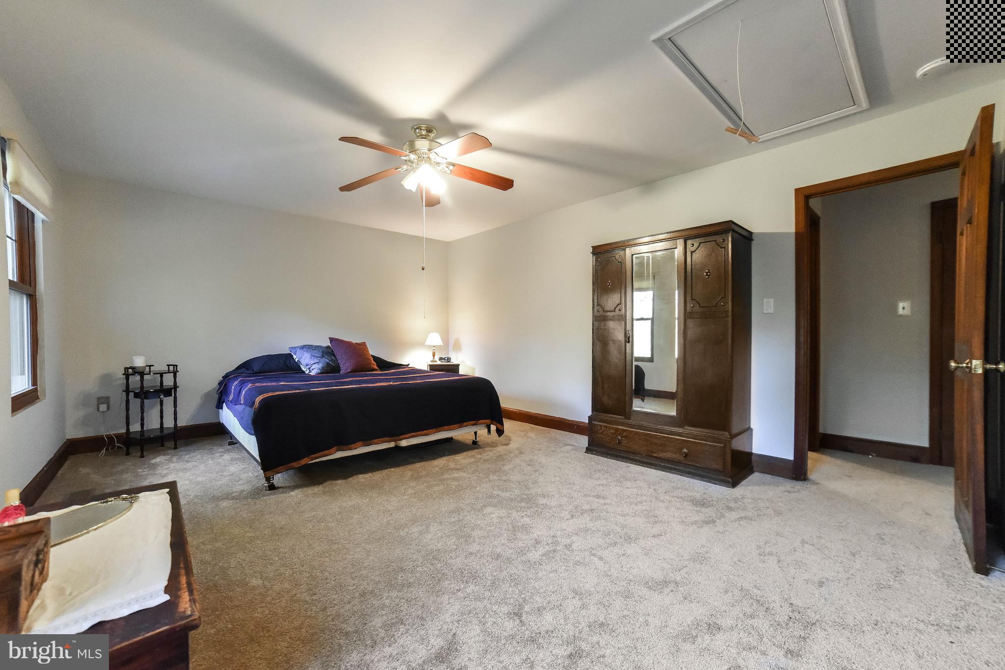 8445 Waverly Road Owings, MD 20736 - Photo 15 of 36 a bedroom with bed and window