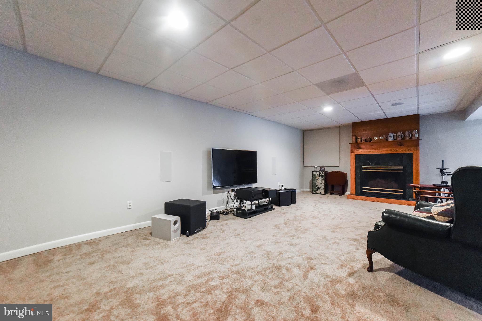 8445 Waverly Road Owings, MD 20736 - Photo 26 of 36 a living room with furniture and a flat screen tv