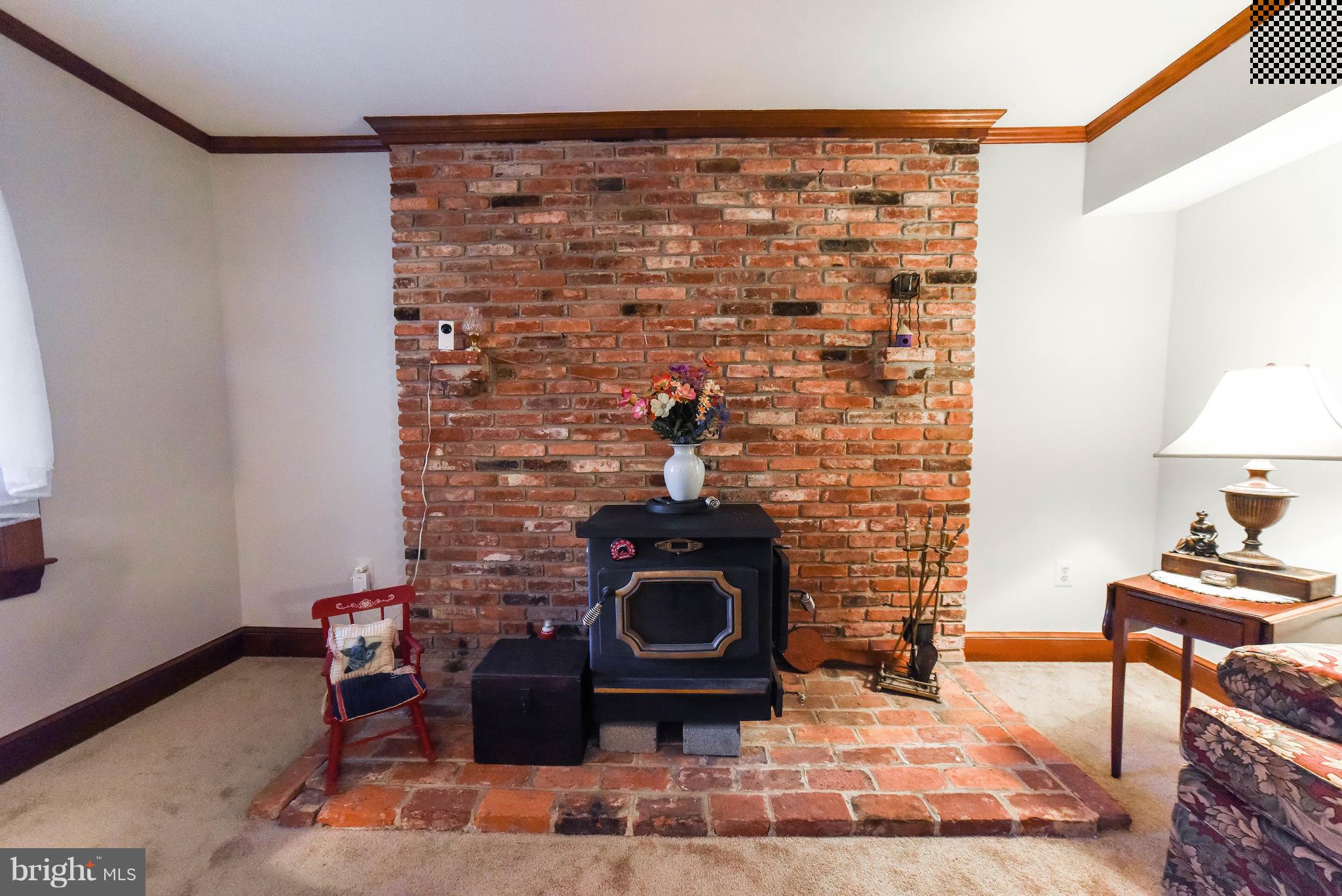 8445 Waverly Road Owings, MD 20736 - Photo 5 of 36 a living room with furniture and a fireplace