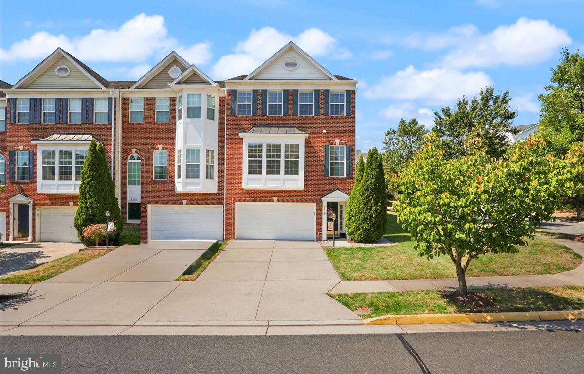a front view of a house with yard