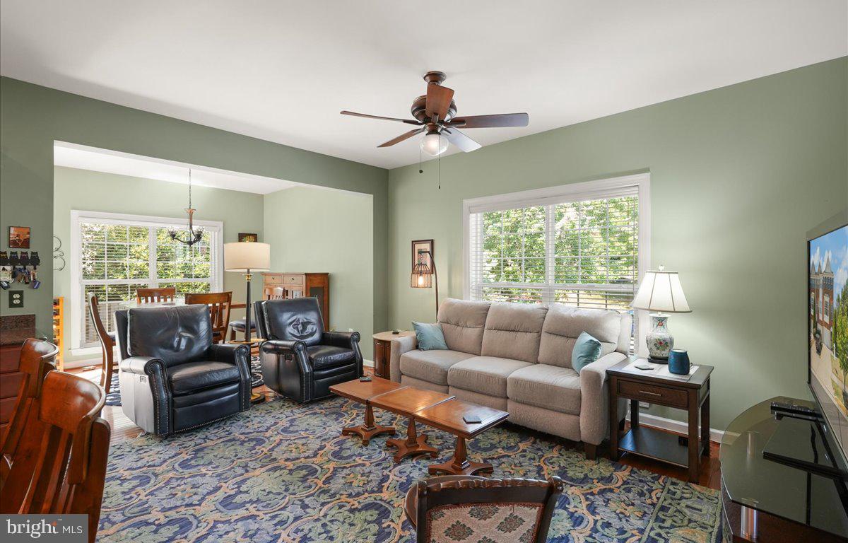 9199 Furey Road Lorton, VA 22079 - Photo 12 of 44 a living room with furniture and a large window