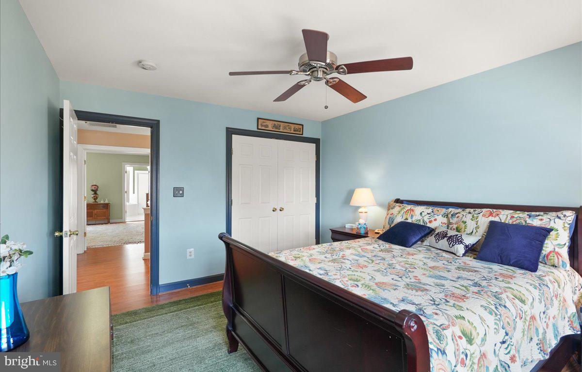 9199 Furey Road Lorton, VA 22079 - Photo 29 of 44 a bedroom with a bed and a mirror