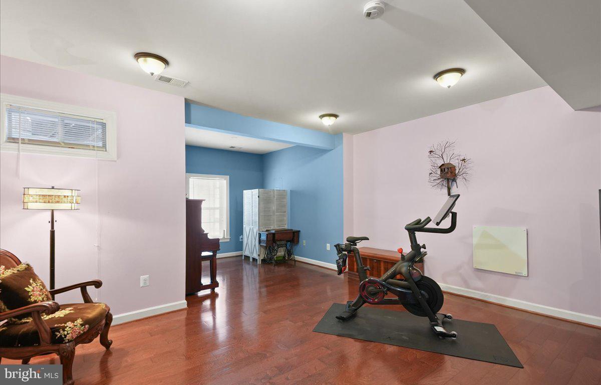 9199 Furey Road Lorton, VA 22079 - Photo 33 of 44 a view of a room with gym equipment