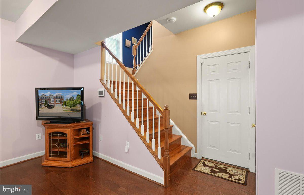 9199 Furey Road Lorton, VA 22079 - Photo 34 of 44 a view of an entryway with wooden floor