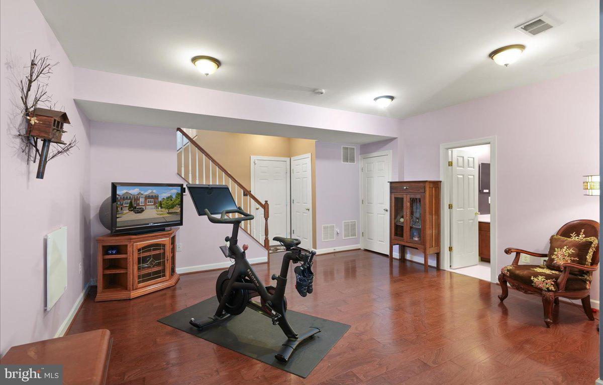 9199 Furey Road Lorton, VA 22079 - Photo 35 of 44 a view of a room with gym equipment