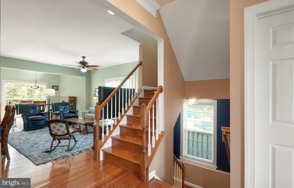9199 Furey Road Lorton, VA 22079 - Photo 5 of 44 a view of entryway livingroom and hall with wooden floor