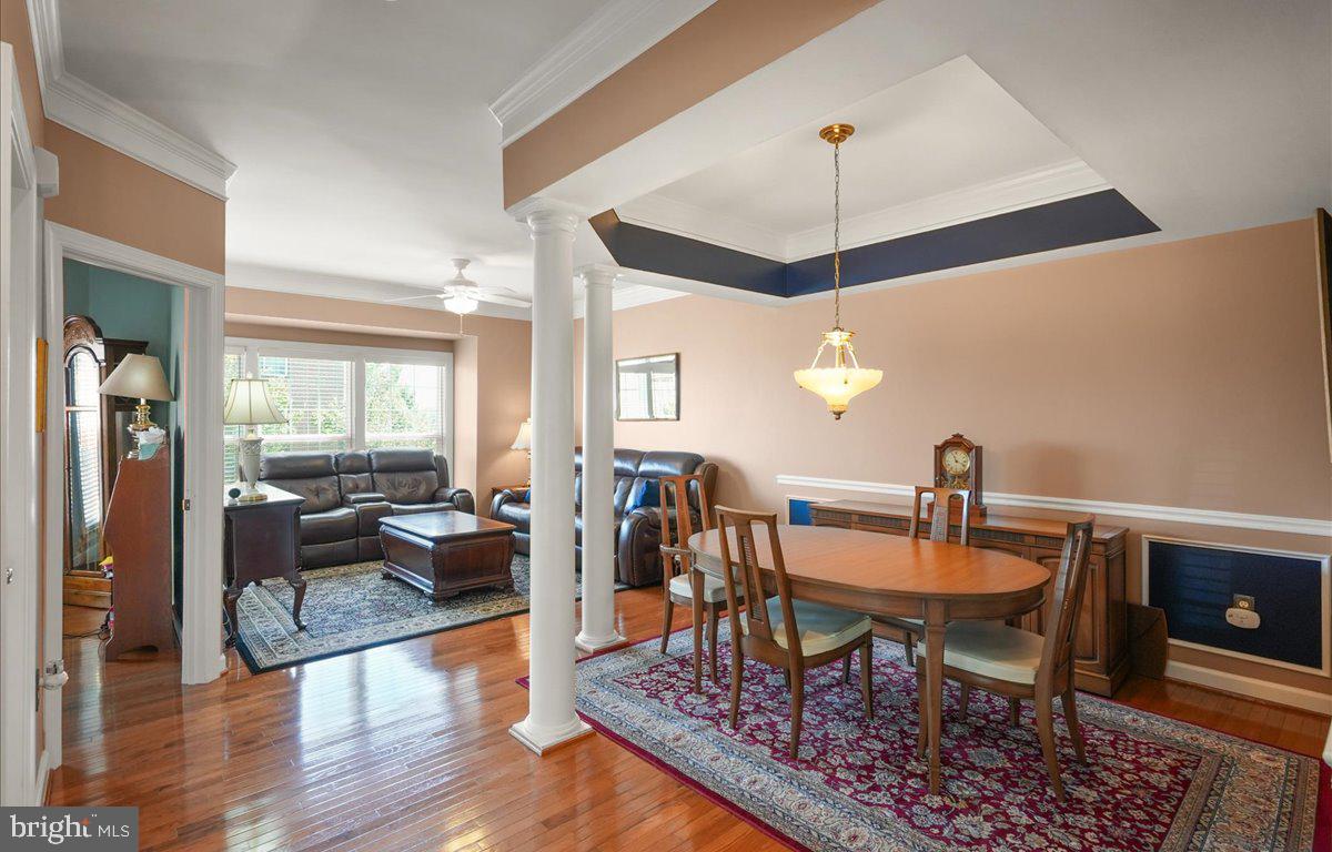 9199 Furey Road Lorton, VA 22079 - Photo 6 of 44 a view of a dining room with furniture window and wooden floor