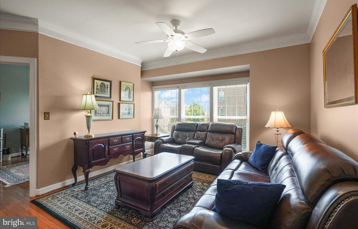 9199 Furey Road Lorton, VA 22079 - Photo 9 of 44 a living room with furniture and a window