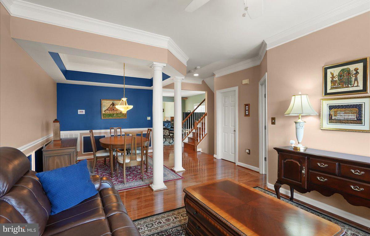 9199 Furey Road Lorton, VA 22079 - Photo 10 of 44 a living room with furniture and wooden floor