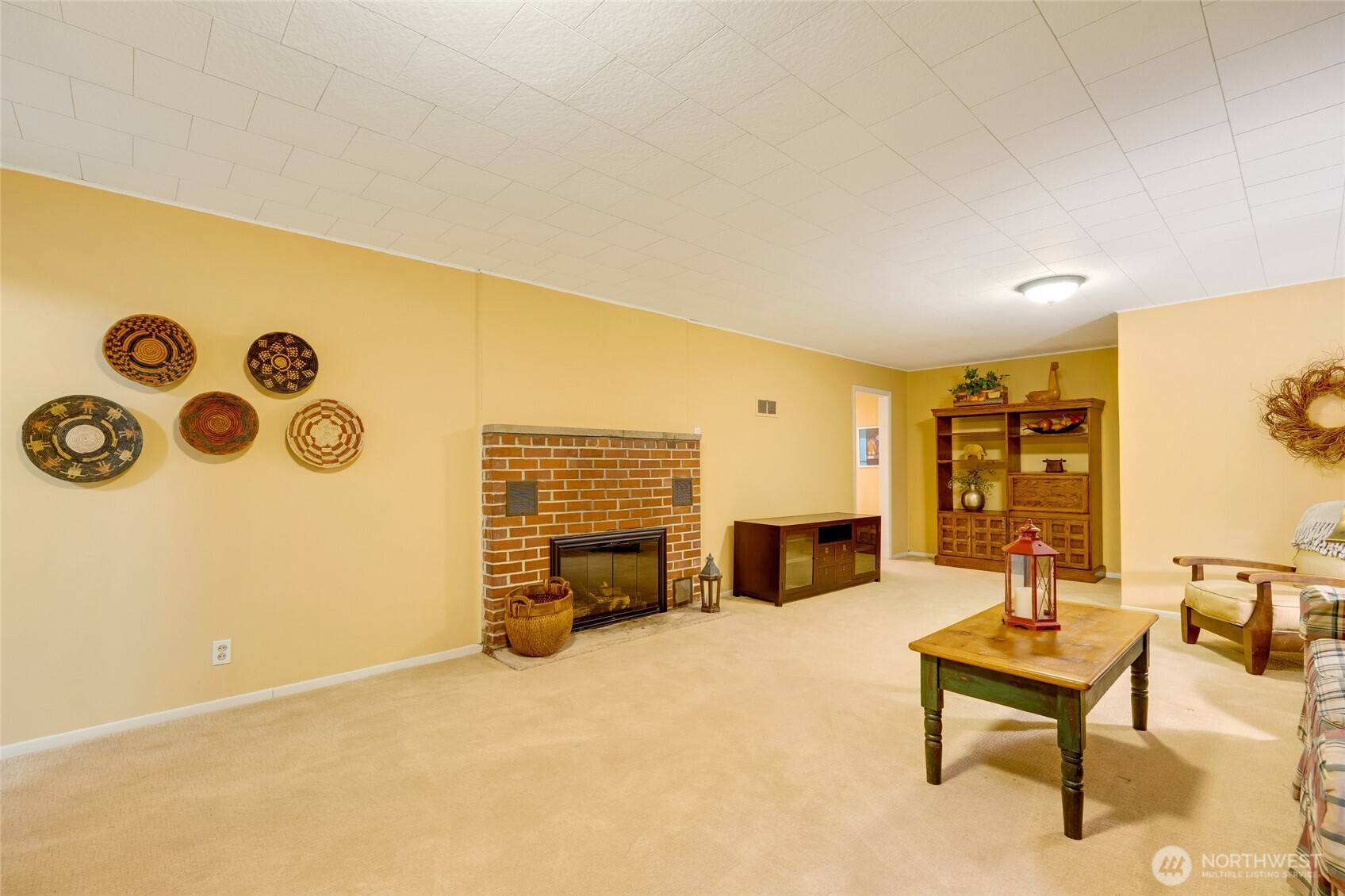 811 Rucker Avenue Everett, WA 98201 - Photo 19 of 34 a living room with furniture and a fireplace