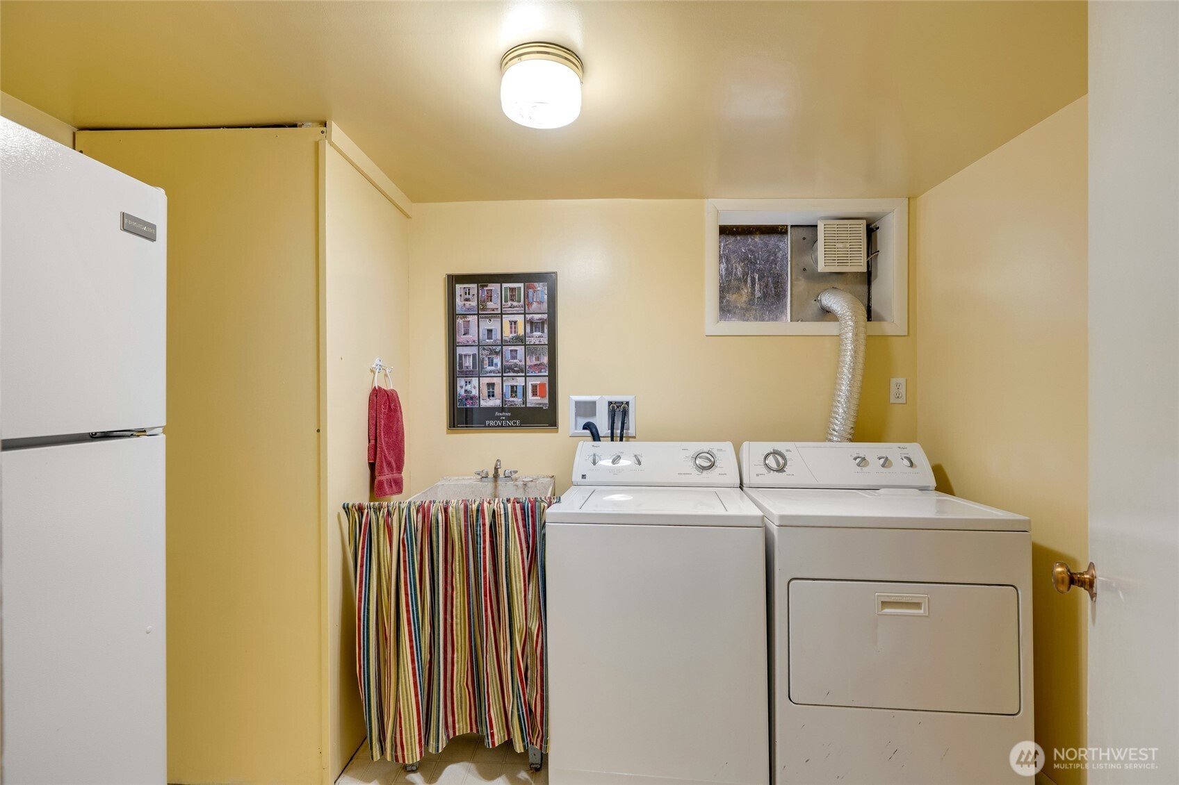 811 Rucker Avenue Everett, WA 98201 - Photo 22 of 34 a utility room with dryer and washer