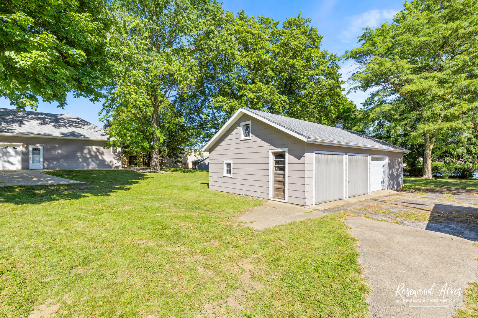 187 East Water Street Kankakee, IL 60901 - Photo 2 of 24 a view of a house with yard and a garden