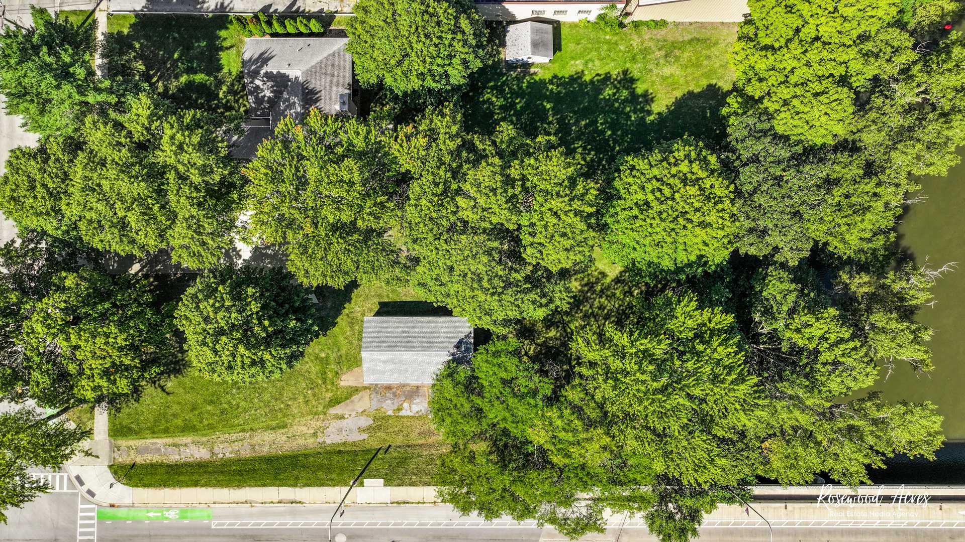187 East Water Street Kankakee, IL 60901 - Photo 21 of 24 an aerial view of residential house with outdoor space and trees all around