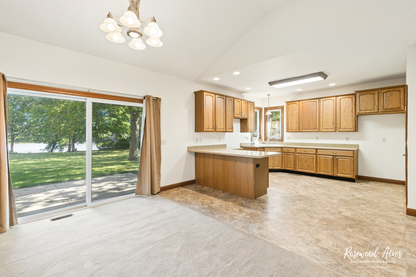 187 East Water Street Kankakee, IL 60901 - Photo 5 of 24 a large white kitchen with a large window