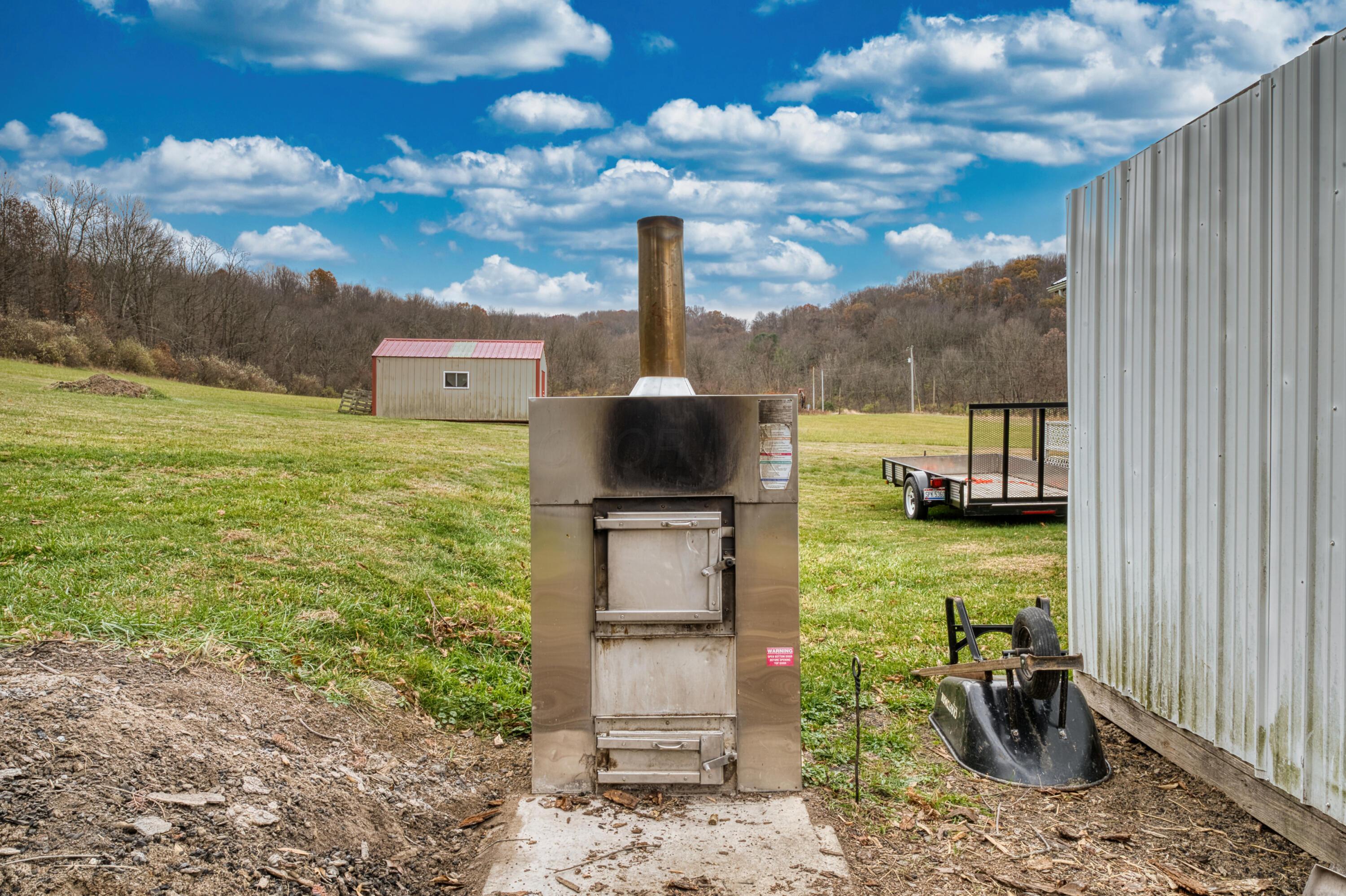 7800 Pine Ridge Road Northeast Newark, OH 43055 - Photo 35 of 52 Hardy Wood Burner