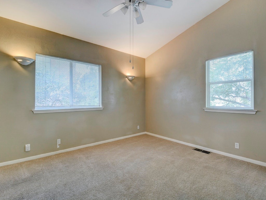 2502 Leon Street, Unit 102 Austin, TX 78705 - Photo 12 of 14 a view of an empty room with a window