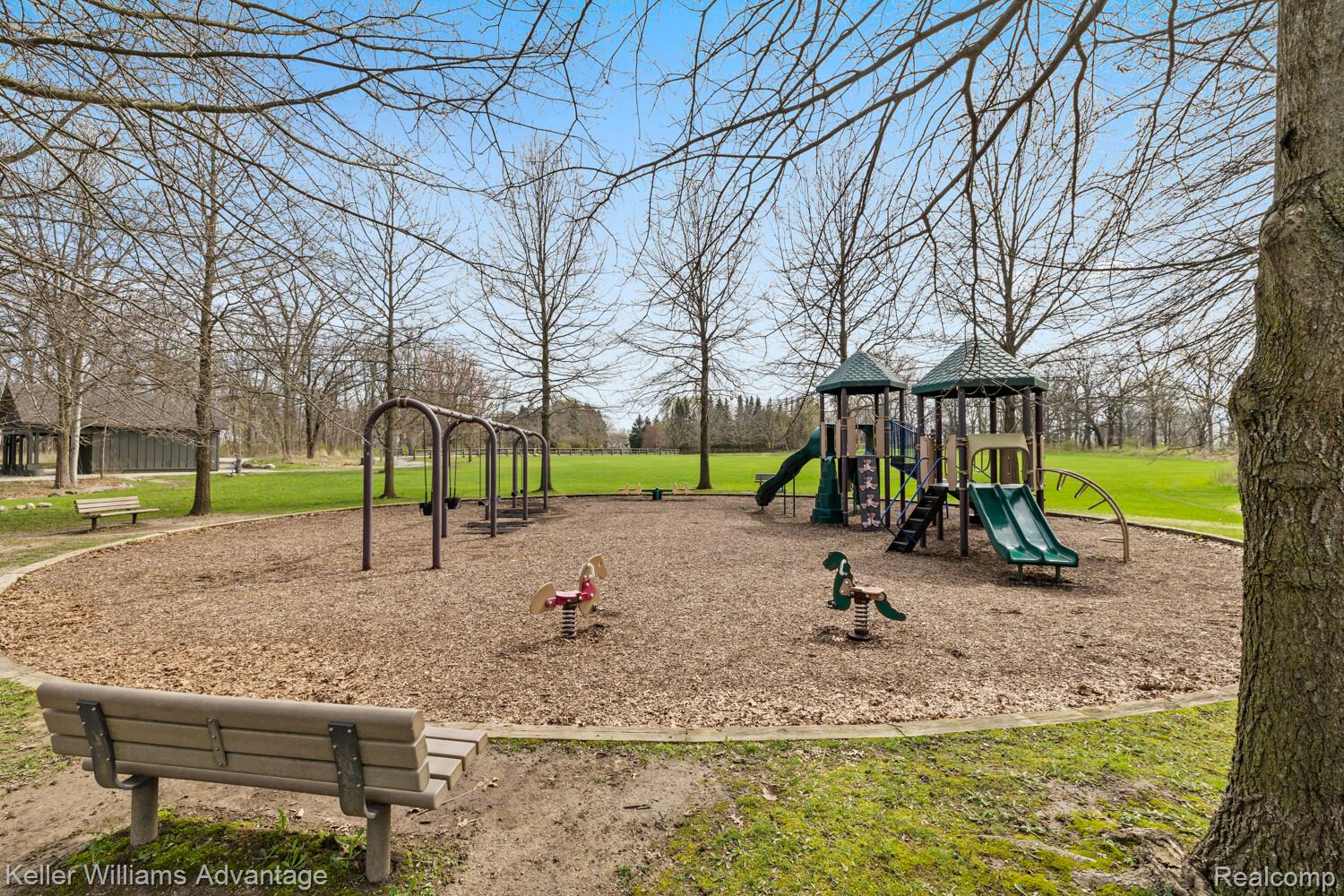 4100 Norwich Court Rochester, MI 48306 - Photo 70 of 72 Community jungle gym with a yard