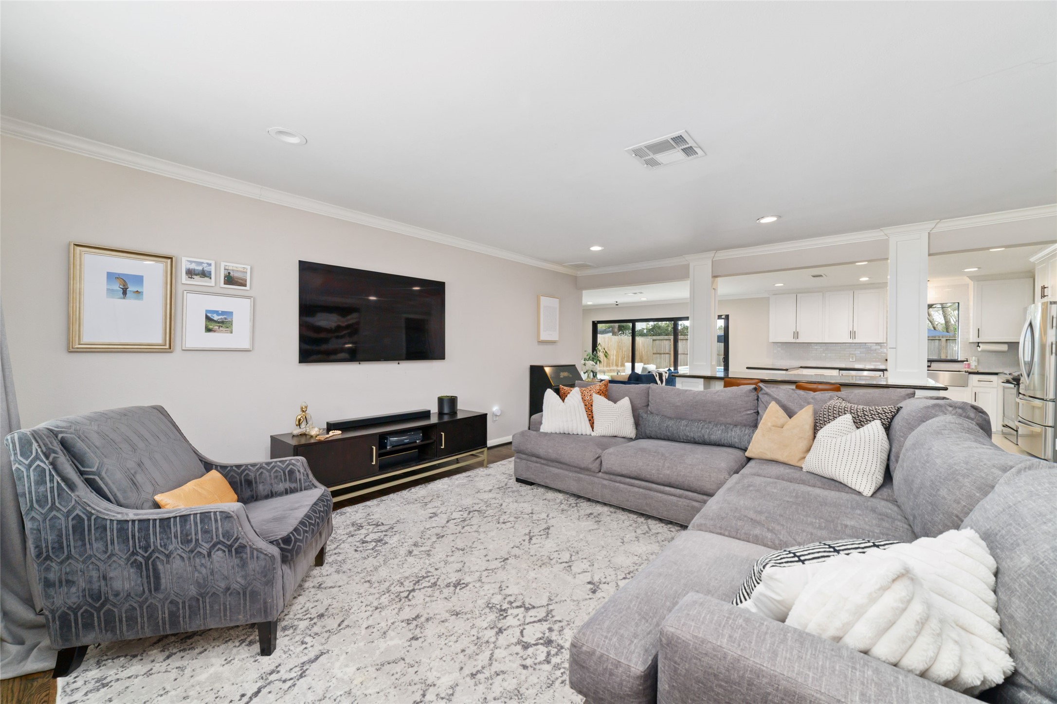 10607 Chimney Rock Road Houston, TX 77096 - Photo 20 of 35 Comfortable main living with a clean TV setup, and these TVs can stay… already professionally mounted and ready to go. Exterior cameras are in place and can be connected, so you’ve got that layer of security from day one. You move in and it’s already handled.