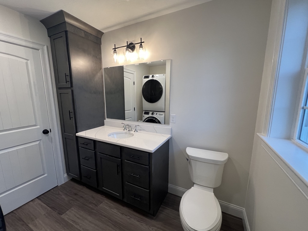 3 Lanigan Path Middleboro, MA 02346 - Photo 11 of 20 a bathroom with a toilet sink and mirror