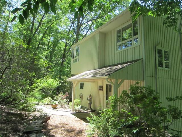30 Rogues Ridge Road Weston, CT 06883 - Photo 1 of 1 a view of a house with a yard