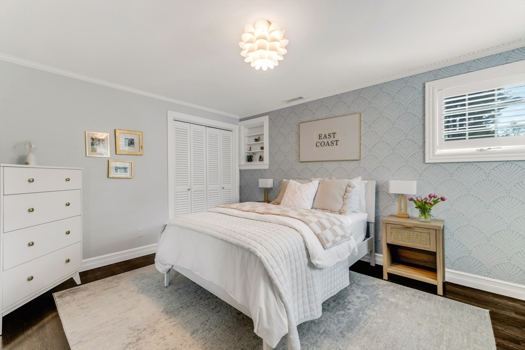 85 Old Farm Road Milton, MA 02186 - Photo 19 of 42 a spacious bedroom with a bed and a window
