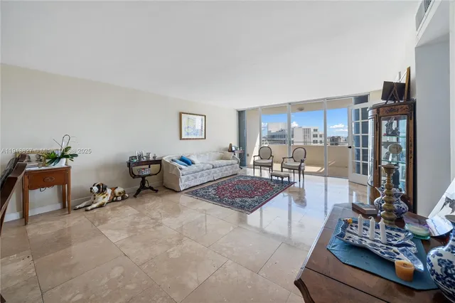a living room with furniture and a table