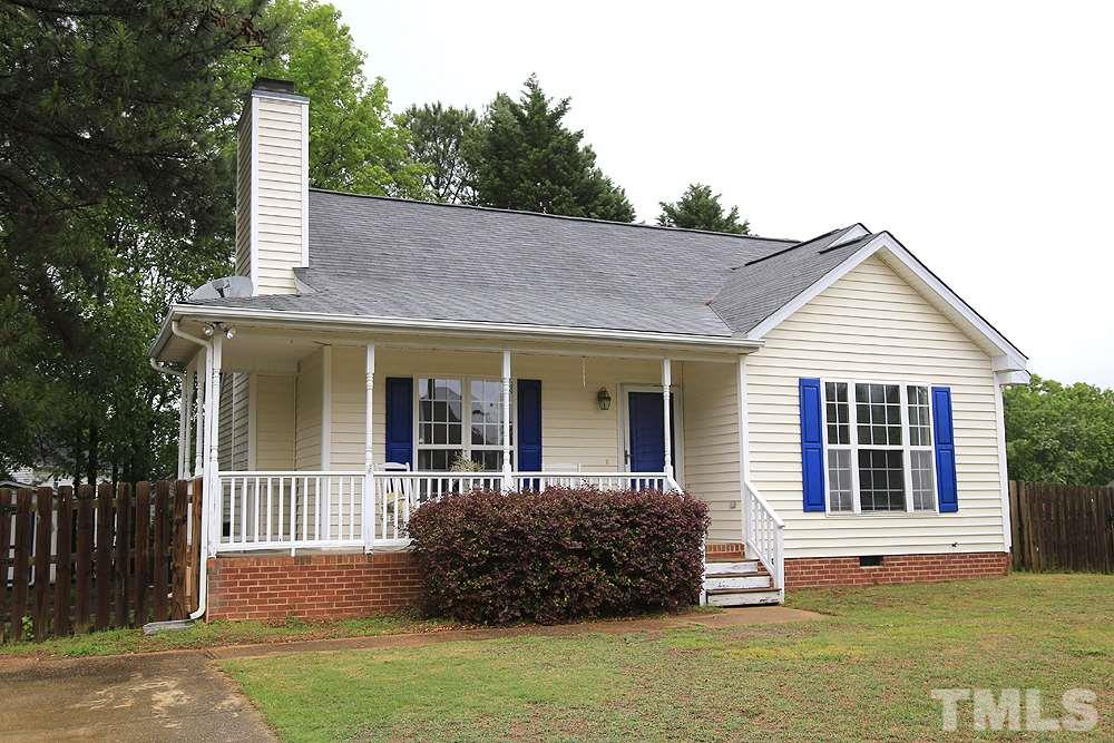 409 Flagg Road Holly Springs, NC 27540 - Photo 1 of 14 Charming home with wrap around porch.
