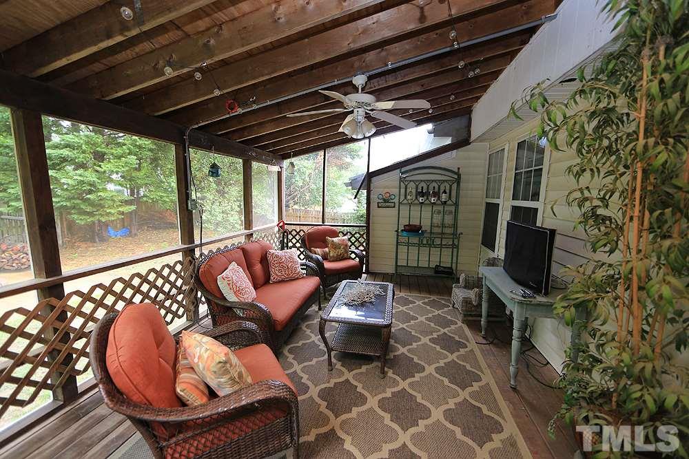409 Flagg Road Holly Springs, NC 27540 - Photo 11 of 14 Awesome screened porch!
