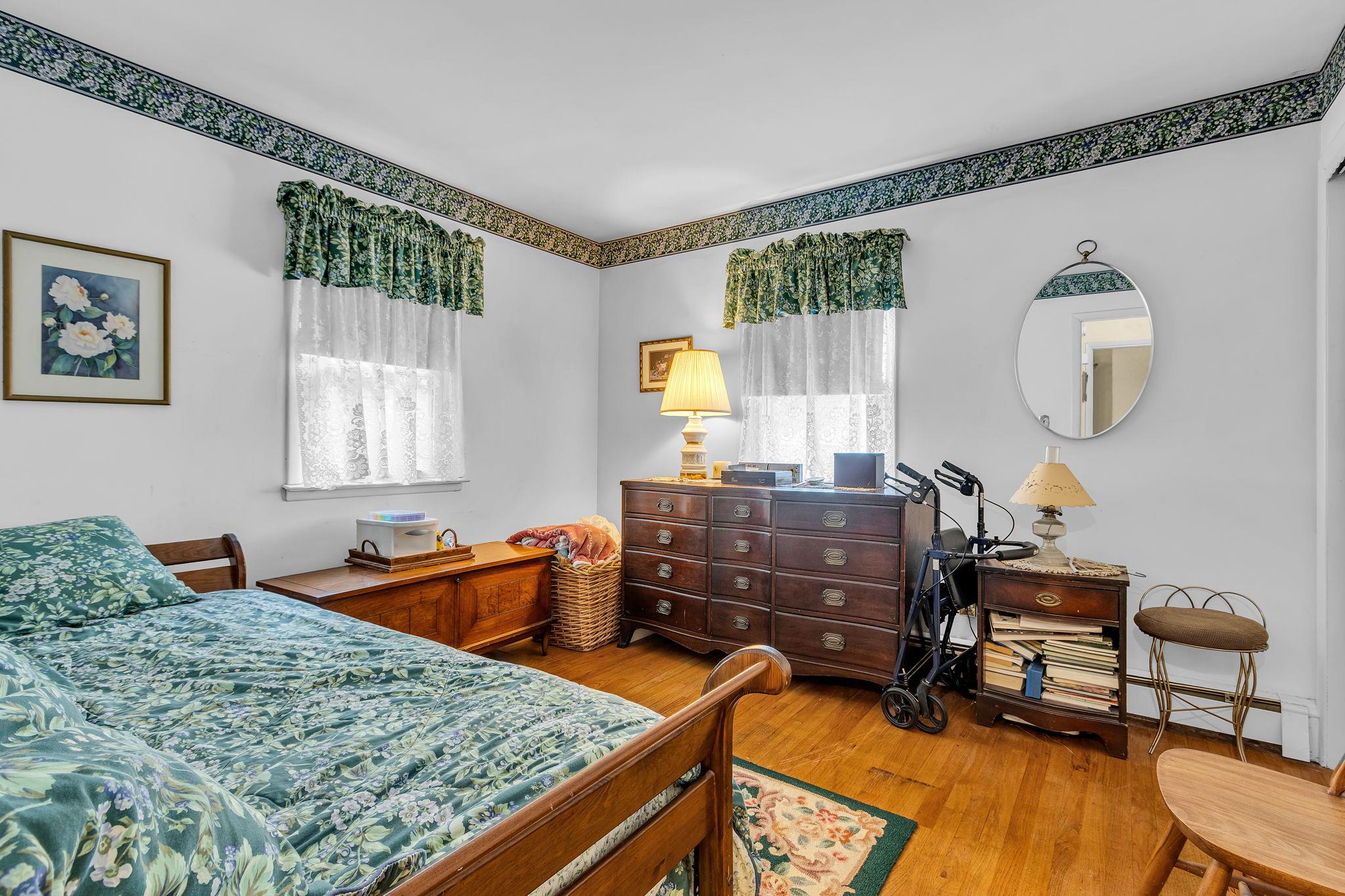 14 Griffen Road Brewster, NY 10509 - Photo 13 of 30 a bedroom with a bed and wooden floor