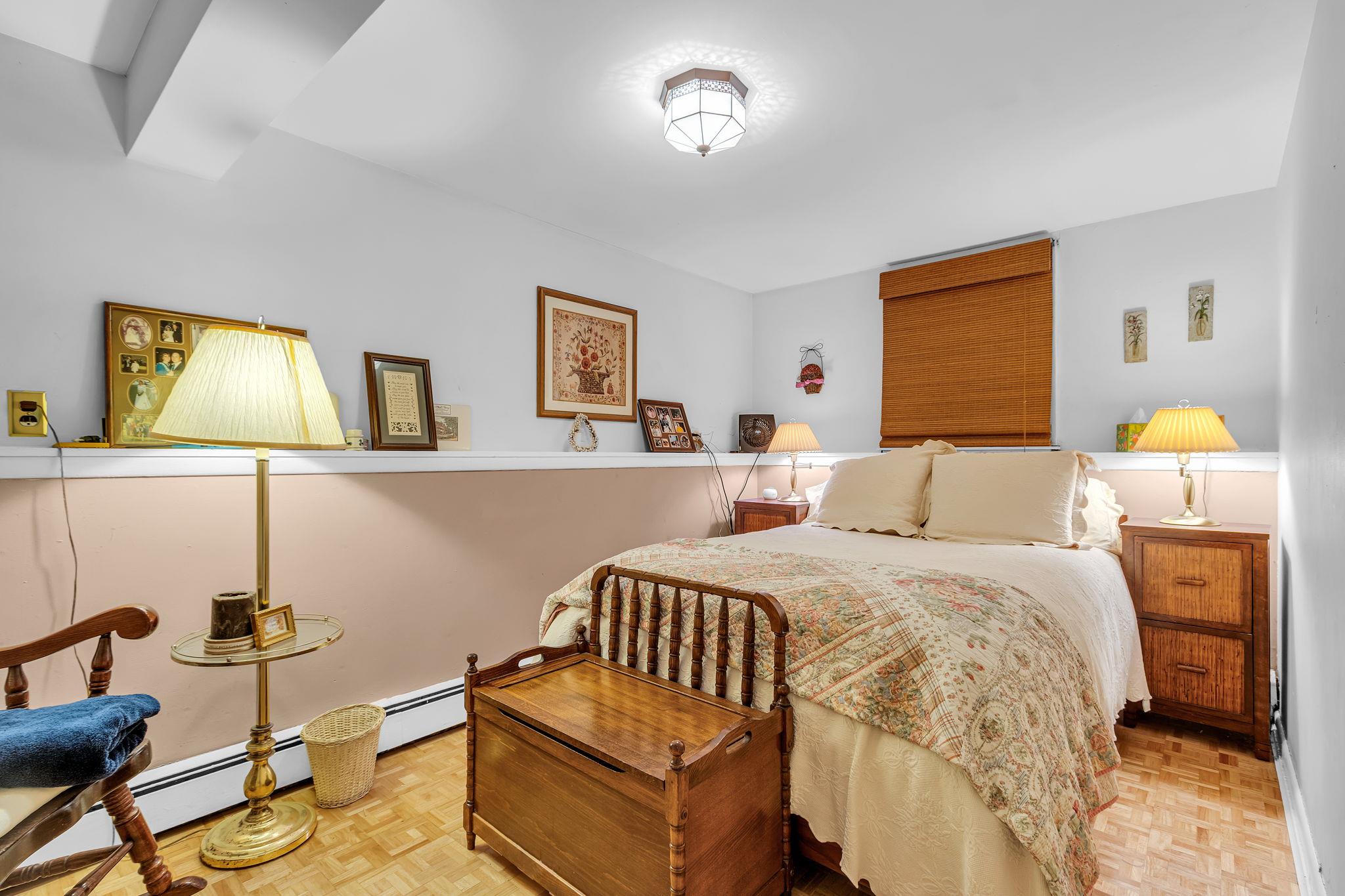 14 Griffen Road Brewster, NY 10509 - Photo 15 of 30 a bedroom with a bed and wooden floor