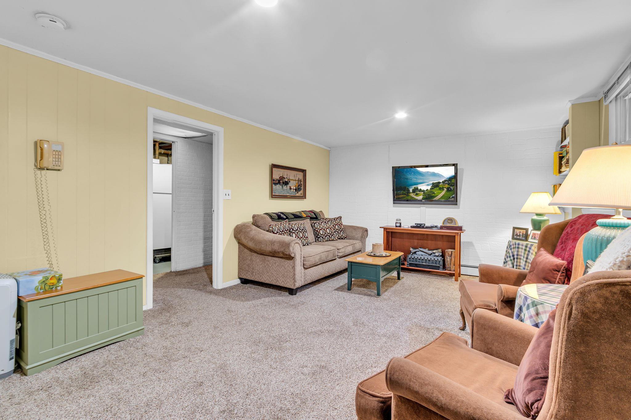 14 Griffen Road Brewster, NY 10509 - Photo 16 of 30 a living room with furniture and a window