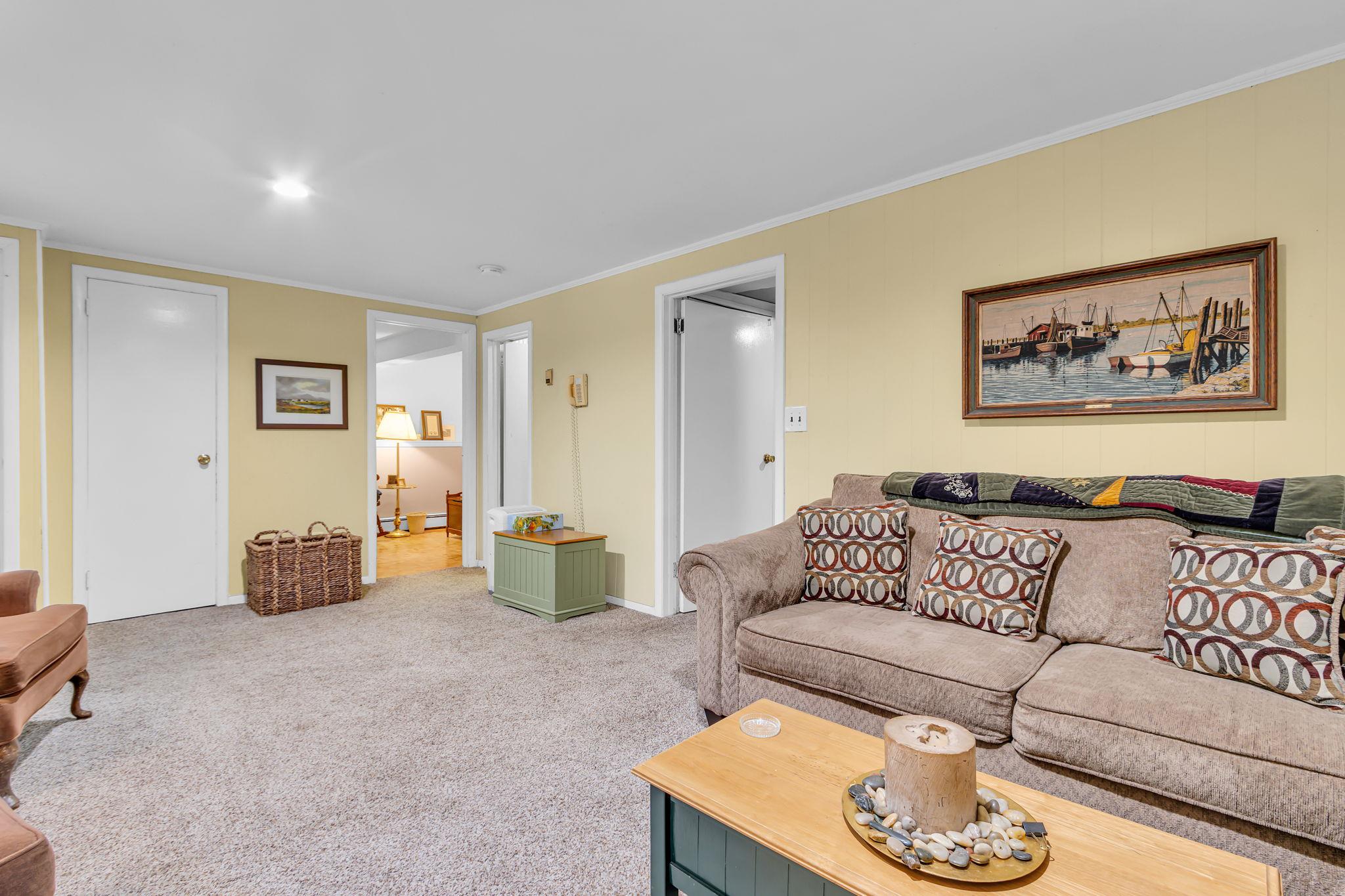 14 Griffen Road Brewster, NY 10509 - Photo 17 of 30 a living room with furniture and wooden floor