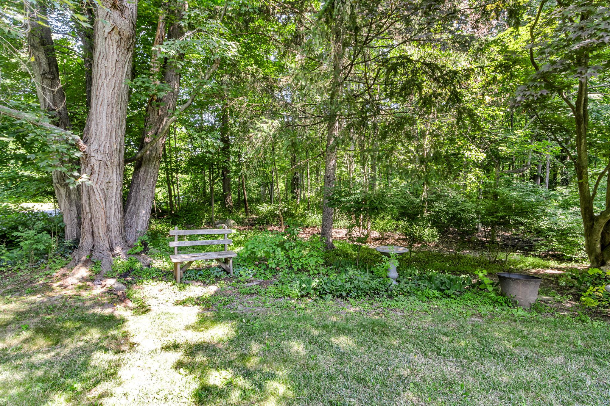 14 Griffen Road Brewster, NY 10509 - Photo 21 of 30 a backyard of a house with table and chairs