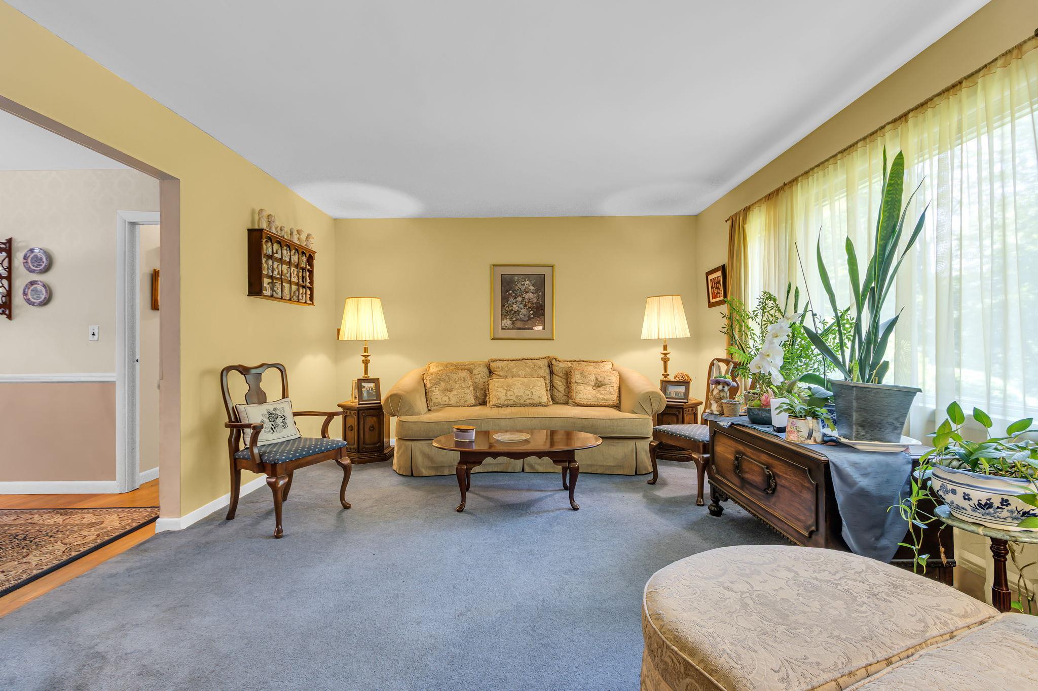 14 Griffen Road Brewster, NY 10509 - Photo 4 of 30 a living room with furniture and a large window